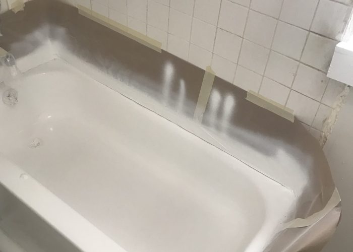 Fresh bathtub with white paint