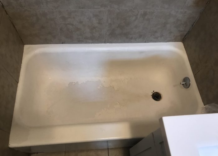 worn out bathtub pain