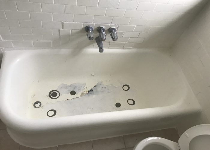 worn out bathtub pain