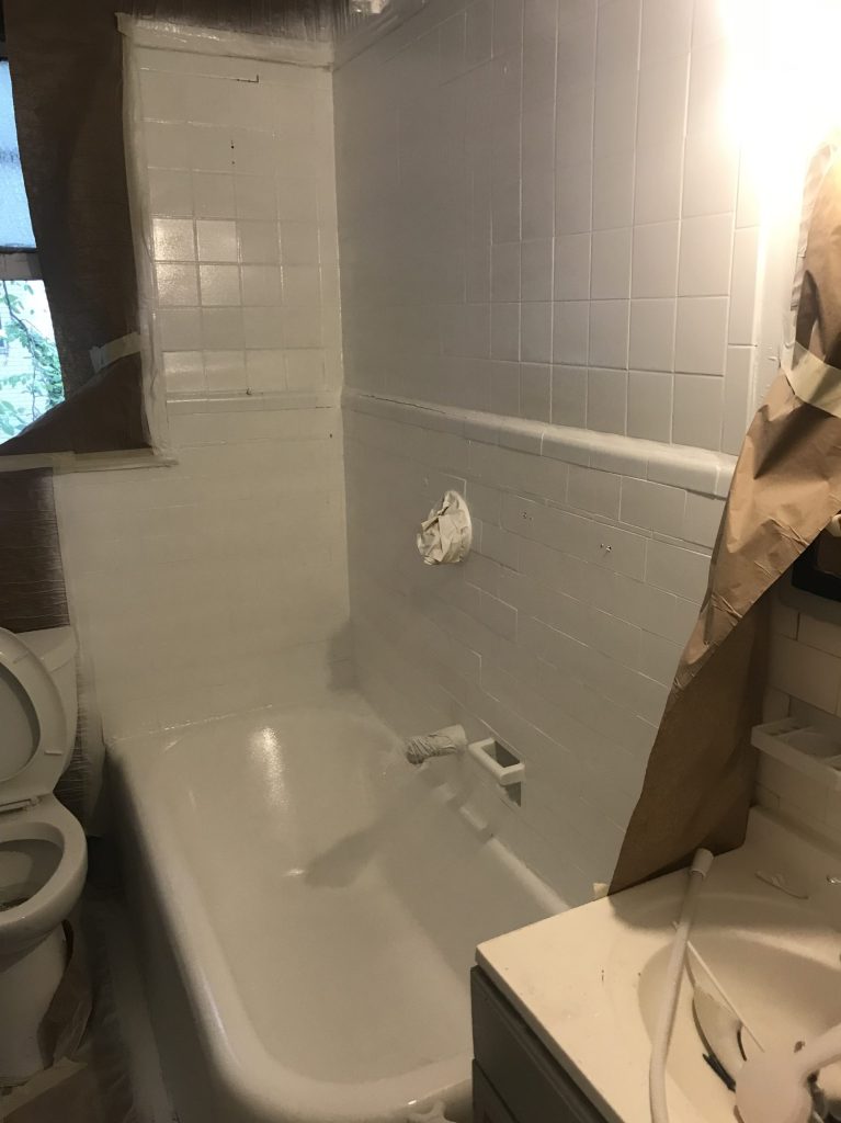 Bathtub reglazing and tiles painted white after Bathtub reglazing and tiles painted white after