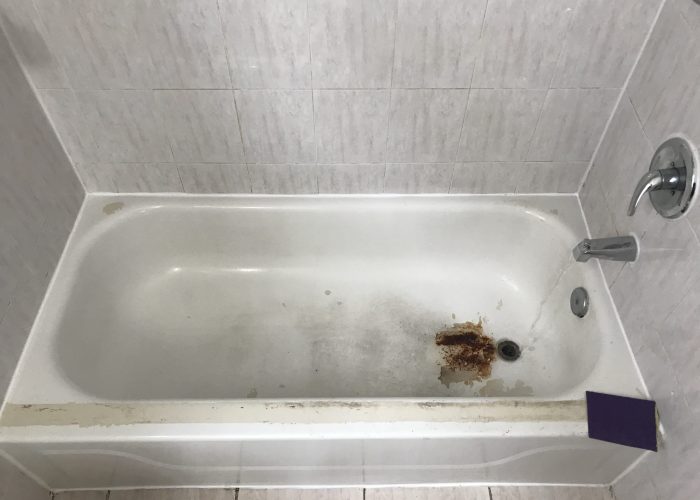 worn out bathtub pain